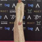 Vestido de The 2nd Skin, clutch Mascaró, joyas Carrera y Carrera