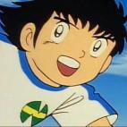 Los jugadores del New Team (equipo inicial de la serie Campeones) vestían con el uniforme blanco y rayas azules durante las primeras temporadas. Más adelante, cuando el equipo se convirtió en Niupi, el azul dejó paso al rojo y la camiseta pa...