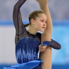 Russia's Julia Lipnitskaia performs in the Women's Figure Skating Team Short Program at the Iceberg Skating Palace during the 2014 Sochi Winter Olympics on February 8, 2014. AFP PHOTO / YURI KADOBNOV (Photo credit should read YURI KAD...
