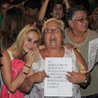 Manifestantes contra el turismo de borrachera.