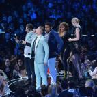 NEW YORK, NY - AUGUST 25: Macklemore accepts the VMA onstage during the 2013 MTV Video Music Awards at the Barclays Center on August 25, 2013 in the Brooklyn borough of New York City. (Photo by Rick Diamond/Getty Images for MTV)