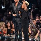 NEW YORK, NY - AUGUST 25: Adam Lambert (L) and Emeli Sande speak onstage during the 2013 MTV Video Music Awards at the Barclays Center on August 25, 2013 in the Brooklyn borough of New York City. (Photo by Rick Diamond/Getty Images for MTV)