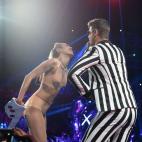 NEW YORK, NY - AUGUST 25: Robin Thicke and Miley Cyrus perform bonstage during the 2013 MTV Video Music Awards at the Barclays Center on August 25, 2013 in the Brooklyn borough of New York City. (Photo by Jeff Kravitz/FilmMagic for MTV)