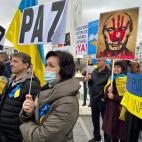 Los carteles calificando a Putin de "asesino" han predominado en la manifestación.