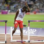 El cubano Dayron Robles reacciona al lesionarse la pierna en la carrera de 110-metros con vallas el pasado miércoles 08 de agosto.