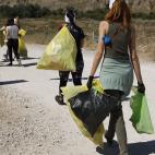 13.000 voluntarios llenaron bolsas amarillas, azules y negras con la basuraleza recogida.