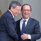 Con Francois Hollande en París, en 2014.