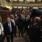 El expresidente ha abandonado el hemiciclo entre saludos afectuosos de su equipo.