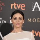 Con pendientes y sortija de Carrera y Carrera