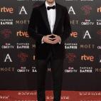 Con esmoquin de Salvatore Ferragamo y camisa de Brooks Brothers