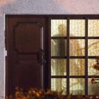 La sombra de un policía a través de la ventana de la residencia de Andreas Lubitz en Montabaur.