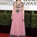 Con vestido de Gucci