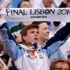 Real Madrid fans show their support in the stands before the game