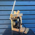 Su padre juega con el chico: esta cámara, la del niño, fue tuneada para hacer un retrato de familia, porque no tiene temporizador.