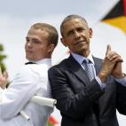 Graduate Robert McConnel asks Obama to strike a "James Bond" pose during the 134th Commencement Exercises of the United States Coast Guard Academy in New London, Connecticut, May 20, 2015.