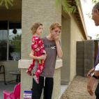 Obama greets neighbors after visiting a model home at the Nueva Villas at Beverly, a single-family housing development owned by local nonprofit organization Chicanos Por La Causa Inc. in Phoenix on Jan. 8, 2015.