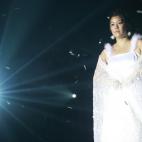 SEOUL, SOUTH KOREA - SEPTEMBER 23: A South Korean model walks down the runway during the 2006 Big Size fashion show entitled 'I Love Me' September 23, 2006 in Seoul, South Korea. 19 ordinary plus-sized women took part in this fashion show. (Ph...