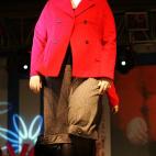 SEOUL, SOUTH KOREA - SEPTEMBER 23: A South Korean model walks down the runway during the 2006 Big Size fashion show entitled 'I Love Me' September 23, 2006 in Seoul, South Korea. 19 ordinary plus-sized women took part in this fashion show. (Ph...