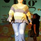 SEOUL, SOUTH KOREA - SEPTEMBER 23: A South Korean model walks down the runway during the 2006 Big Size fashion show entitled 'I Love Me' September 23, 2006 in Seoul, South Korea. 19 ordinary plus-sized women took part in this fashion show. (Ph...