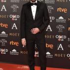 Con esmoquin de Dsquared y zapatos de Jimmy Choo.