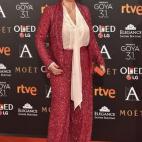 Con esmoquin paillet de Iván Campaña.