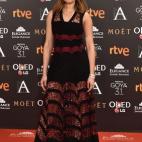 De Alaïa y zapatos de Manolo Blahnik.