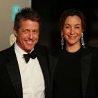 Hugh Grant y Anna Eberstein.