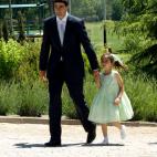 Julia Janeiro y su padre el d&iacute;a de la comuni&oacute;n de su hermana, Andrea Janeiro.