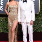 Ella, de Atelier Versace y &eacute;l, de Gucci.