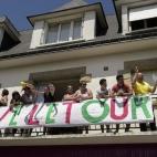 Colonizar el balcón de la casa de tu amigo, que para algo vive en una calle por donde pasa la carrera.