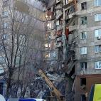 MAGNITOGORSK, RUSSIA - DECEMBER 31, 2018: Clearing the debris at the site of an apartment building collapse. A suspected domestic gas blast caused a partial collapse of a residential building at 164 Karla Marksa Prospekt Street killing three peo...