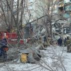 MAGNITOGORSK, RUSSIA - DECEMBER 31, 2018: Clearing the debris at the site of an apartment building collapse. A suspected domestic gas blast caused a partial collapse of a residential building at 164 Karla Marksa Prospekt Street killing three peo...