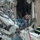 MAGNITOGORSK, RUSSIA - DECEMBER 31, 2018: Clearing the debris at the site of an apartment building collapse. A suspected domestic gas blast caused a partial collapse of a residential building at 164 Karla Marksa Prospekt Street killing three peo...
