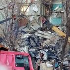 MAGNITOGORSK, RUSSIA - DECEMBER 31, 2018: Clearing the debris at the site of an apartment building collapse. A suspected domestic gas blast caused a partial collapse of a residential building at 164 Karla Marksa Prospekt Street killing three peo...
