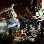 ANKARA, TURKEY - DECEMBER 13 : Rescue workers are seen at the station after high-speed train crashed in Turkish capital Ankara on December 13, 2018. (Photo by Dogukan Keskinkilic/Anadolu Agency/Getty Images)