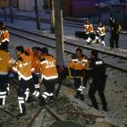 ANKARA, TURKEY - DECEMBER 13 : Rescue workers evacuate injured passengers after high-speed train crashed in Turkish capital Ankara on December 13, 2018. (Photo by Dogukan Keskinkilic/Anadolu Agency/Getty Images)