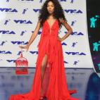 Lil Mama con una jaula