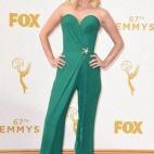 La actriz de Mad Men vestida con un mono verde de Ulyana Sergeenko.