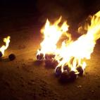 Las Bolas de fuego cobran protagonismo en Nepaja, El Salvador, cada 31 de agosto. La fiesta tiene dos lecturas, una religiosa, que dice que estas bolas son las que lanzaba el diablo contra el patr&oacute;n San Jer&oacute;nimo; y otra p...