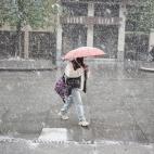 Los paraguas, refugio de la nieve en Navarra