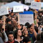 Pancarta 'Reiniciando el sistema' del 15-M.