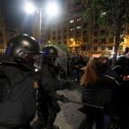 Catalan pro-independence demonstrators and riot police clash during a protest against police action outside the National Police headquarters, in Barcelona, Spain, October 26, 2019. REUTERS/Sergio Perez