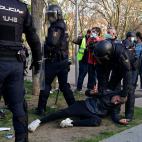 Police detain a person during a demonstration against a political rally of far-right party Vox ahead of regional elections in Madrid's suburb of Vallecas on April 7, 2021. (Photo by JAVIER SORIANO / AFP) (Photo by JAVIER SORIANO/AFP via Getty Images)