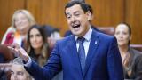 El presidente de la Junta de Andalucía, Juanma Moreno, interviene durante la sesión de control en el pleno del Parlamento, el 13 de noviembre de 2025, en Sevilla.