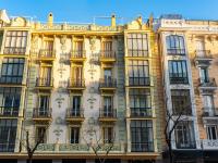 Facades of classic buildings of beautiful architecture on Calle Goya in Madrid, Salamanca district