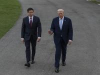 El presidente de EEUU, Donald Trump, y su secretario de Estado, Marco Rubio, hablan con la prensa en la Casa Blanca antes de volar a Miami, el 20 de marzo de 2026.
