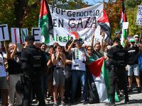 BOLA DEL MUNDO, SPAIN - SEPTEMBER 13: Pro - Palestine protesters during the La Vuelta - 80th Tour of Spain 2025, Stage 20 a 164.8km stage from Robledo de Chavela to Bola del Mundo. Puerto de Navacerrada 2253m / #UCIWT / on September 13, 2025 in Bola del Mundo. Puerto de Navacerrada, Spain. (Photo by Tim de Waele/Getty Images)