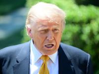 WASHINGTON, UNITED STATES - MAY 12: U.S. President Donald Trump speaks to members of the press before boarding Marine One on the South Lawn of the White House in Washington, United States, on May 12, 2026. (Photo by Kyle Mazza/Anadolu via Getty Images)