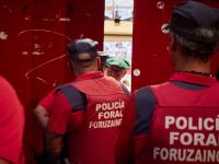 PAMPLONA NAVARRA, SPAIN - JULY 13: Foral police watch the bullring minutes before the seventh and penultimate running of the bulls of the San Fermin 2022 fiestas of the Don Victoriano del Rio Cortes ranch on July 13, 2022, in Pamplona, Navarra, Spain. The festivities in honor of San Fermin, patron saint of Navarre, begin on July 6 with the traditional chupinazo and continue until July 14 with the chanting of 'Pobre de mi' (Poor me). During its course there are a total of eight running of the bulls that begin every day at eight o'clock in the morning. In addition, the City Council has prepared a repertoire of concerts, open-air dances, fireworks, exhibitions, street entertainment and activities for citizens and visitors. This festival, which attracts millions of visitors every year for its festive atmosphere and its popular running of the bulls, has been declared of International Tourist Interest. (Photo By Eduardo Sanz/Europa Press via Getty Images)