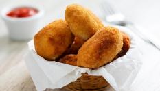 Ración de croquetas en un restaurante